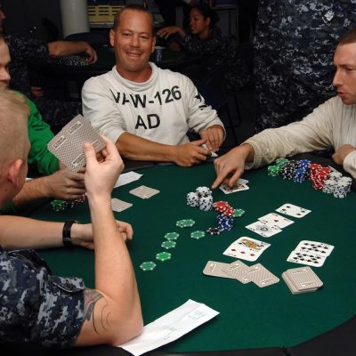 US Navy 090620 N 2798F 033 Sailors assigned to the aircraft carrier USS Harry S. Truman CVN 75 and Carrier Air Wing CVW 3 compete in a Texas Hold Em Poker tournament aboard Harry S. Truman